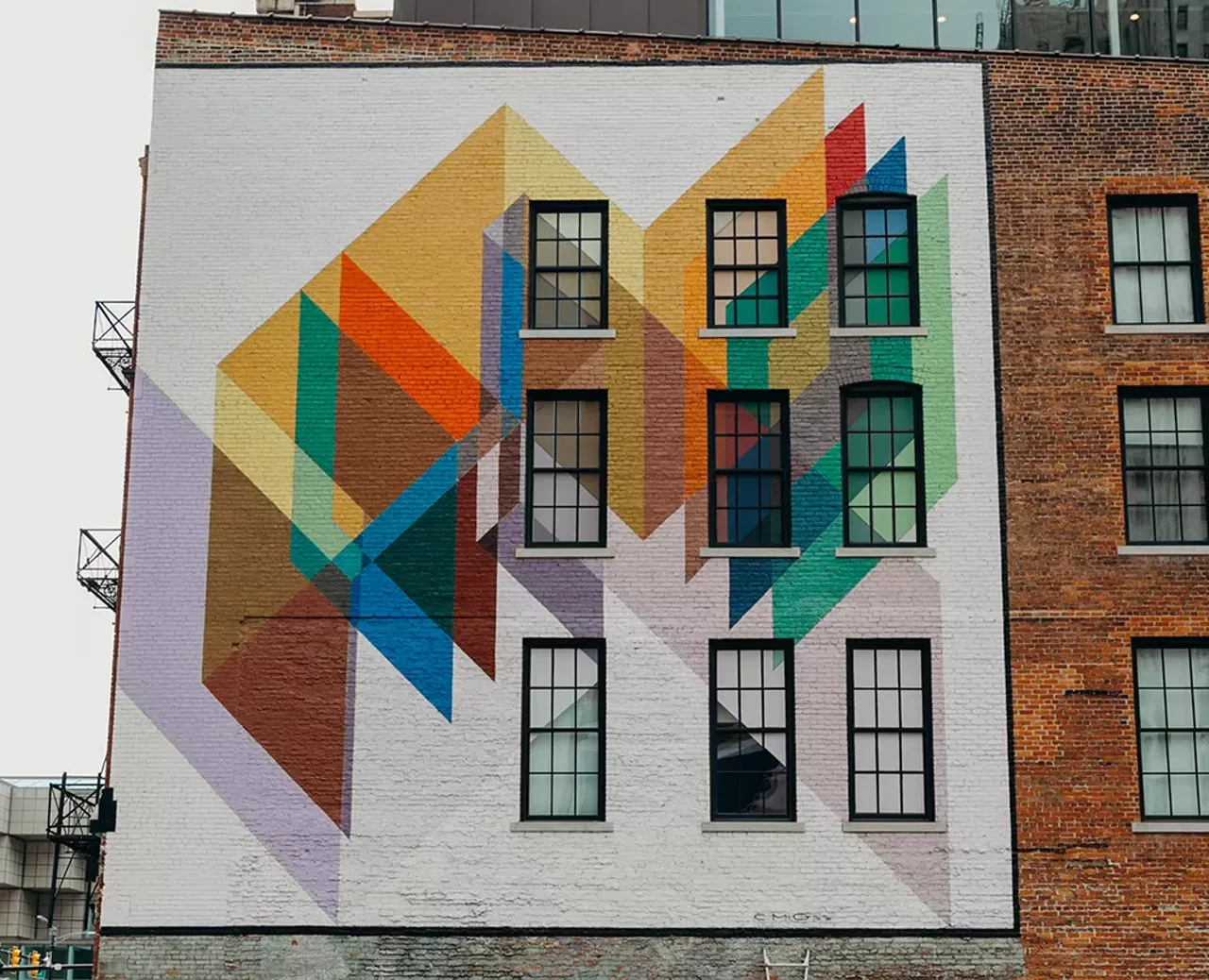 Untitled mural
Detroit Foundation Hotel; 250 W. Larned St., Detroit; 313-800-5500; detroitfoundationhotel.com
Completed in 1974 on the former Pontchartrain Wine Cellars (now the Detroit Foundation Hotel) as part of a public works project, this colorful, geometric mural was restored in 2019 with the help of muralist Hubert Massey.
Photo courtesy of the Detroit Foundation Hotel