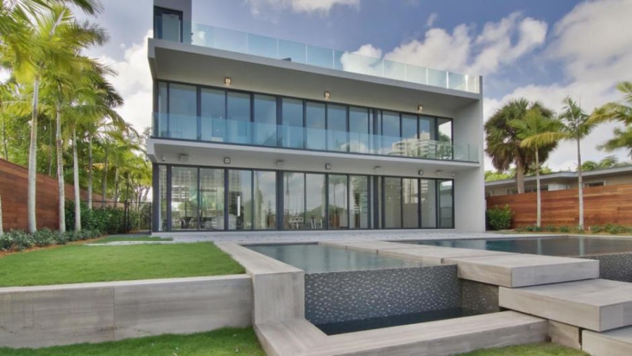 Ok, some good, clean modernism. I'll take it. Apparently he paid $7.7 million in cash for this 5,200-square-foot Miami Beach place.