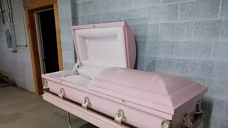 A casket inside O’Neil Swanson Funeral Home in Ypsilanti.