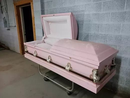 A casket inside O’Neil Swanson Funeral Home in Ypsilanti.