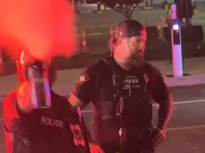 Two white Flint cops sprayed mace at customers and workers at a food truck after arresting a man for dancing.