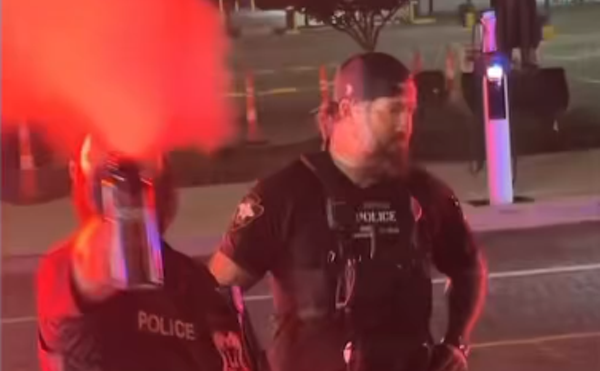 Two white Flint cops sprayed mace at customers and workers at a food truck after arresting a man for dancing.