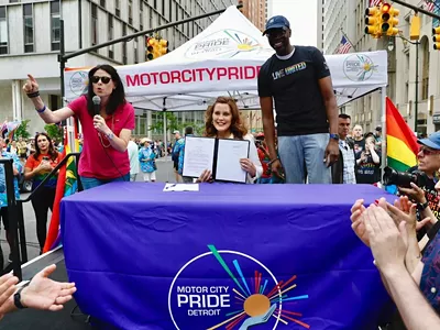 Gov. Whitmer, center, was joined by Lt. Governor Garlin Gilchrist II, right, and Attorney General Dana Nessel, left, for the Pride announcement.
