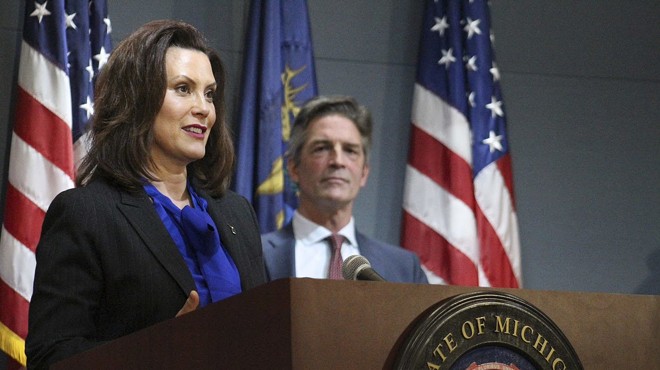 Gov. Gretchen Whitmer and Gerry Anderson, executive chairman of DTE, at a press conference Monday.