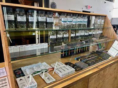 A display case with deli-style flower and other cannabis products at Utopia Gardens.