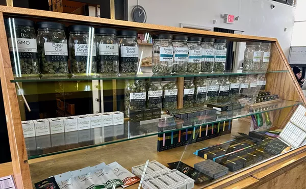 A display case with deli-style flower and other cannabis products at Utopia Gardens.