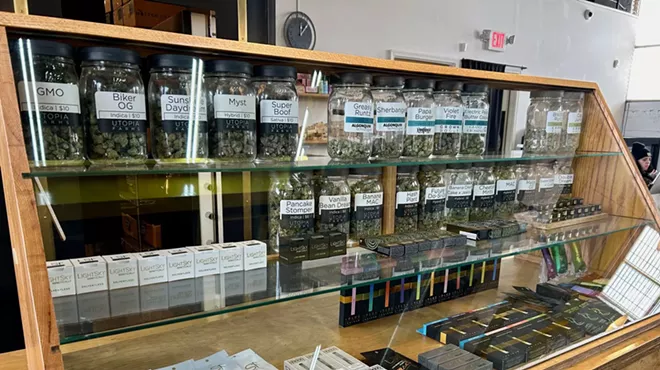 A display case with deli-style flower and other cannabis products at Utopia Gardens.