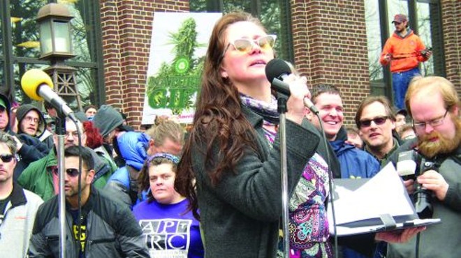 Michigan Moms United founder Charmie Gholson speaking at Hash Bash in Ann Arbor.