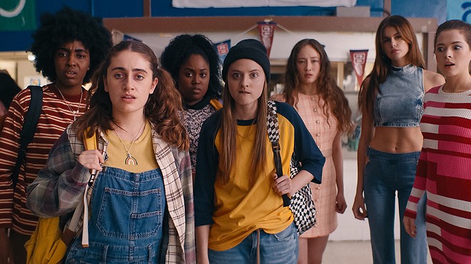 In Bottoms, queer girls Josie (Ayo Edebiri) and PJ (Rachel Sennott), on the far left, cope with the absurdity of high school.